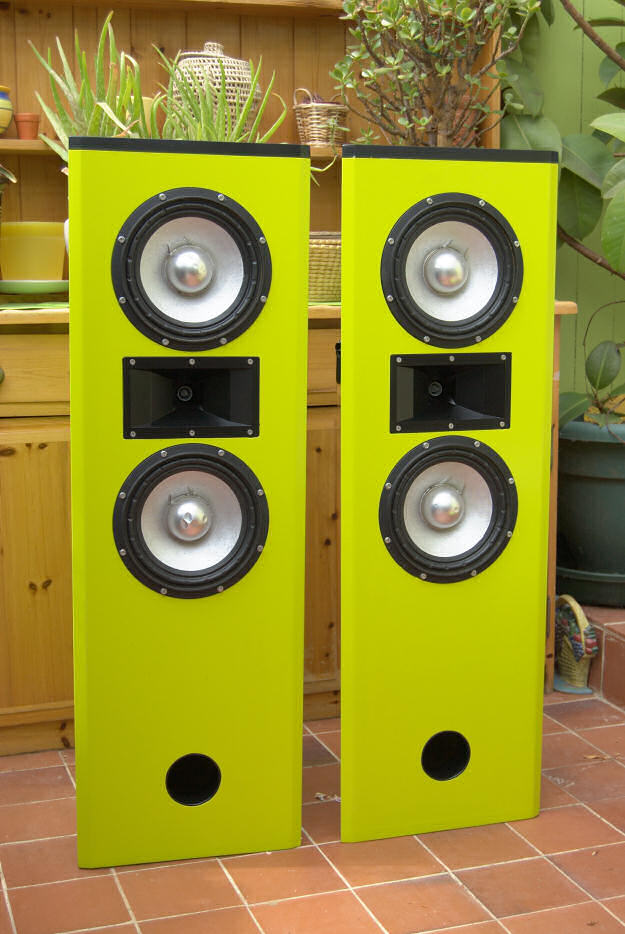 A Pair of tall, bright green speakers, showing the drivers in an MTM arrangement.