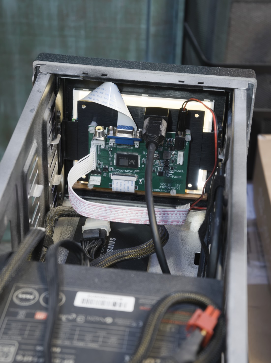 The complete assembly inside the server, viewed from behind.