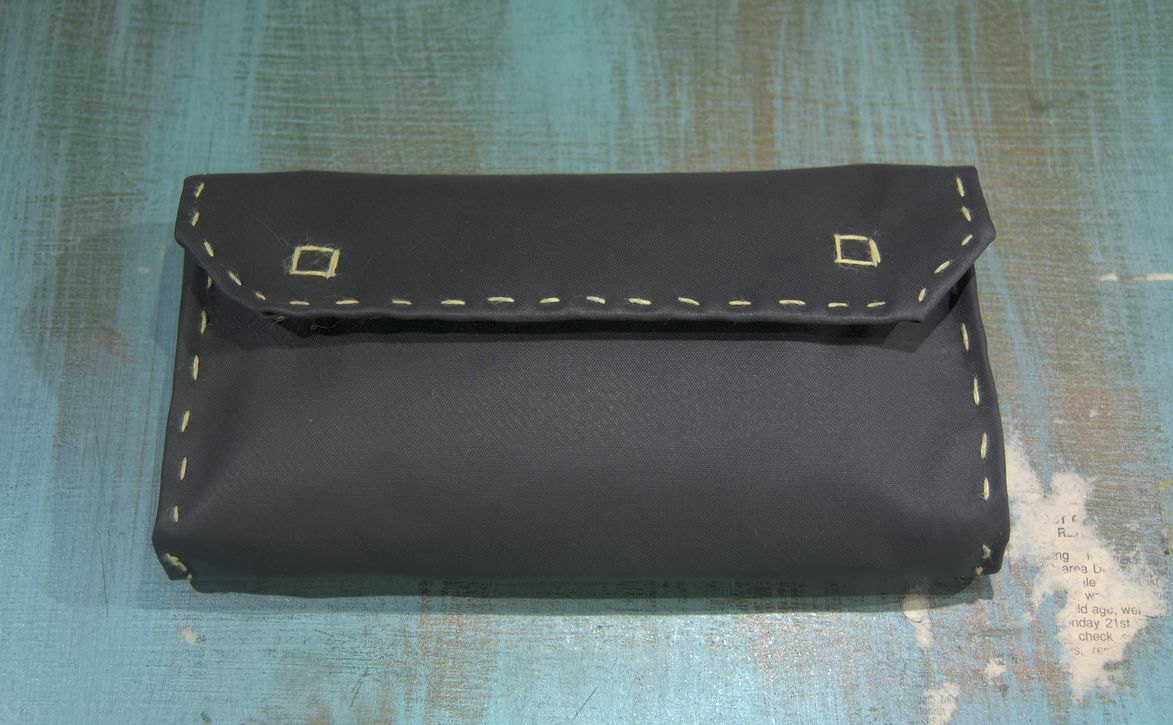The completed pouch, with the flap closed.